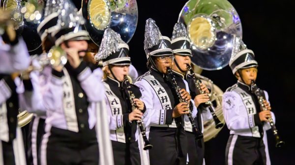 Beyond The Notes: The North Atlanta Marching Band plays the night away with harmonious instruments and melodies.