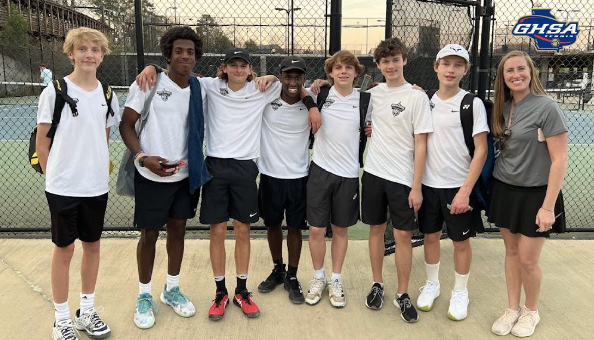 Playoff Prosperity: 2023 Boys Varsity Tennis celebrate a big win.