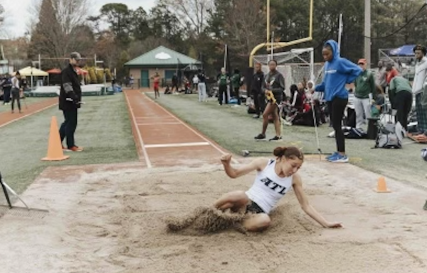 Mia Stimpson competing in the long jump at the Roswell Rotary Relays in March of 2024. 