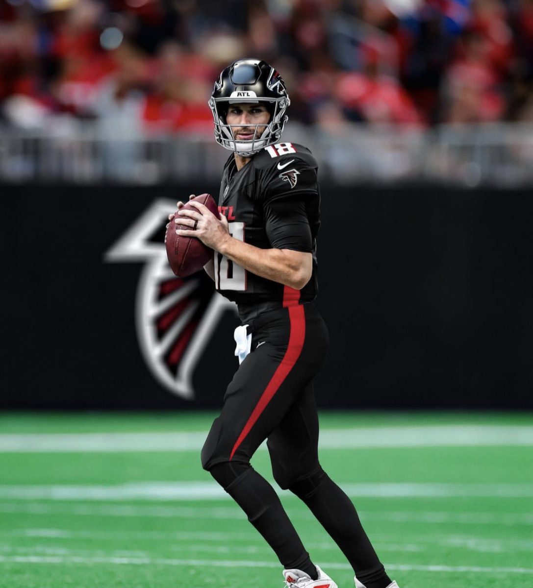 New chapter: Kirk Cousins dons his new threads as he looks to turn the Falcons into contenders.
