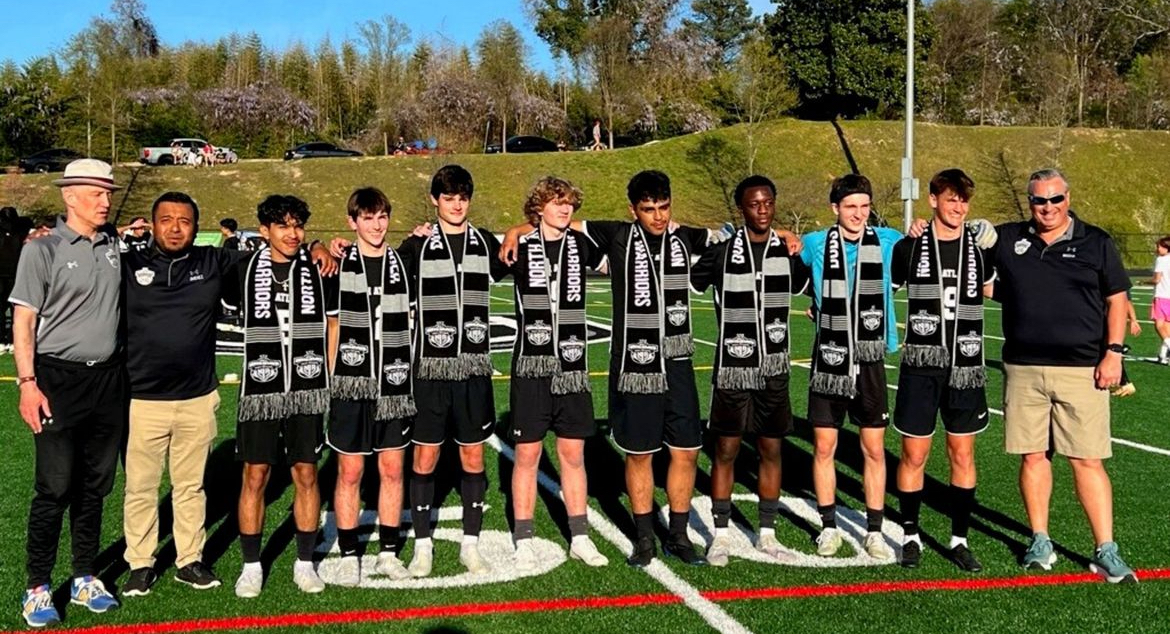 The men’s soccer class of ‘24 lines up together during the senior night ceremony