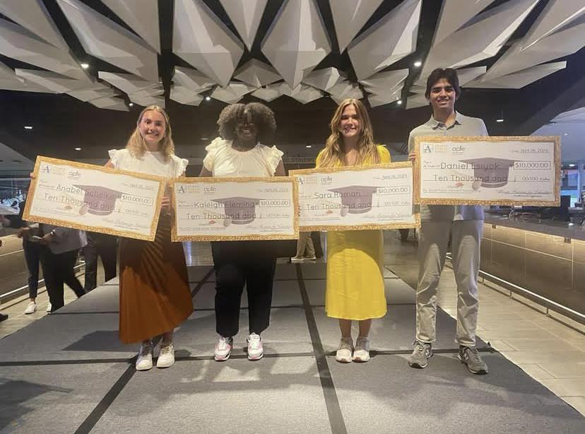 Seniors Anabel Schelke, Kaleigh Fleming, Sara Roman, and Daniel Esiyok bring home the gold with Sneakers and Scholarships Foundation Scholarship.