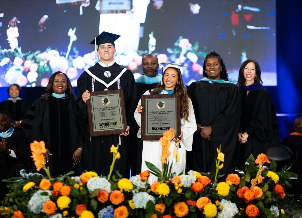 Principal Angela Mitchell, Warrior Scholar Athlete Award recipient Ian Reynolds, APS Superintendent Bryan Johnson, Warrior Scholar Athlete Award recipient Victoria Carlucci, Board Chair Erika Mitchell, Board Vice Chair Jennifer McDonald