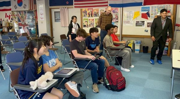 Gavyn Eastman (11th grade), Jesalyn Mollica (11th grade), and Jordan Watters (11th grade) learning Japanese in class.