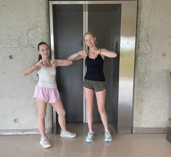 Sophomores Beatrice Reichert and Sophia Makovetska-Towe wait patiently for the elevator’s long arrival.