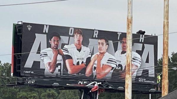 The NAHS football billboard stands tall in front of I-75