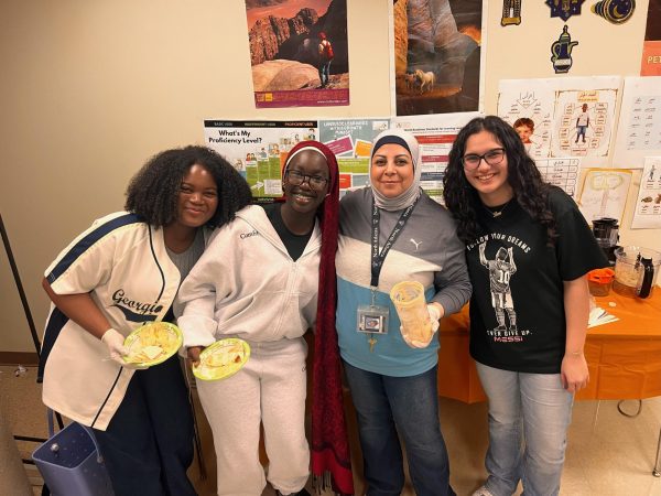 A Taste of Culture: ACC members make traditional hummus with Ms. Hasan.