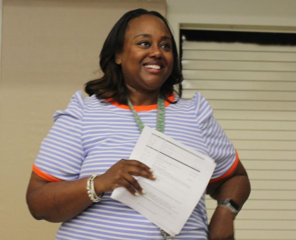 Dr.Mitchell shows her passion for the new school year during teacher orientation week.