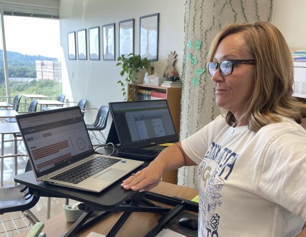 Erin Turner looking attentively at her AI Detector.
