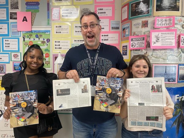 Madison Gilstrap, Robin Oliver, and Sydney York shine their latest copies of the Warrior Wire and Windows!