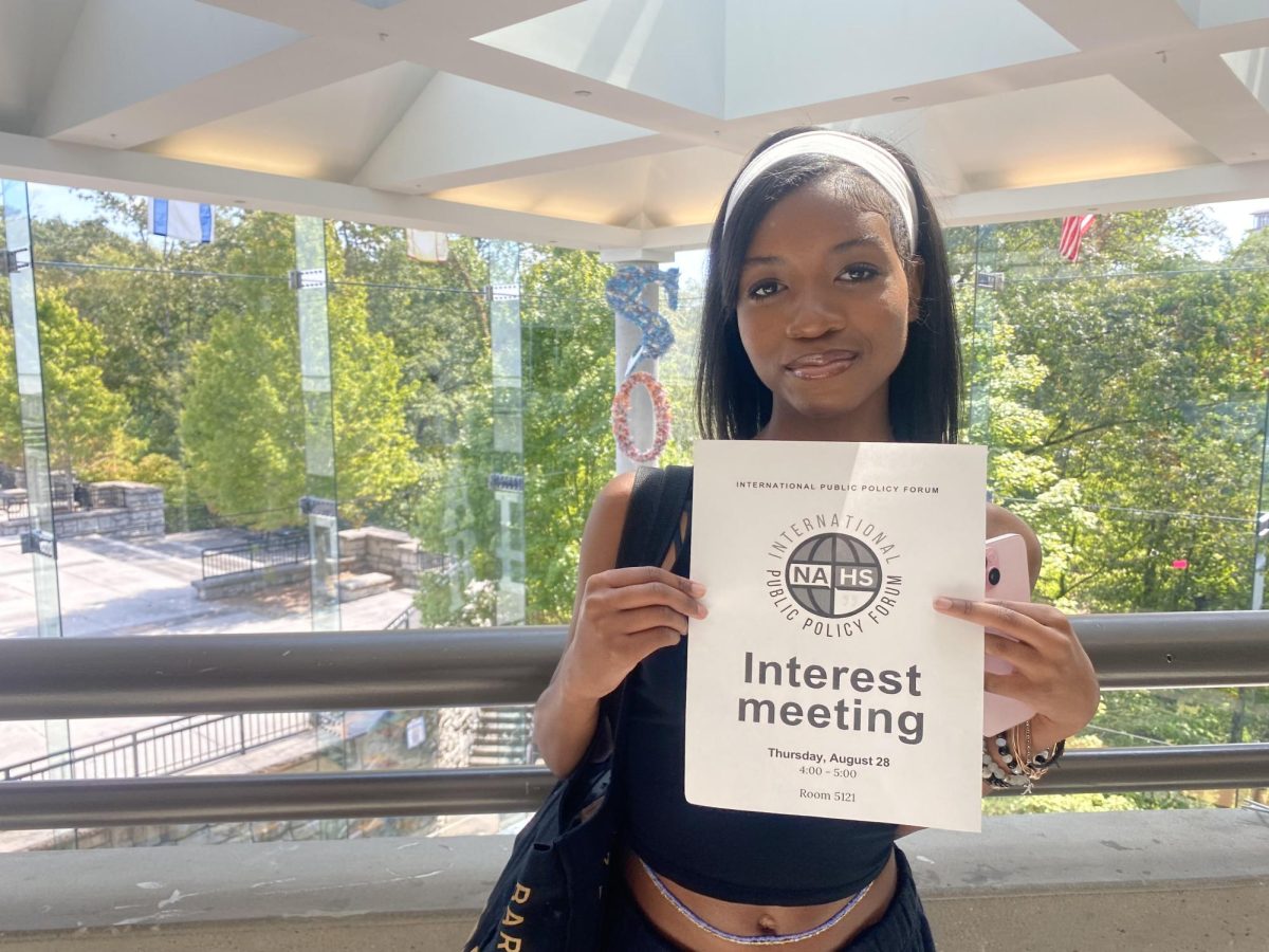 Lead editor Kimberly Boyd (11) proudly showing the flyer for the IPPF interest meeting.