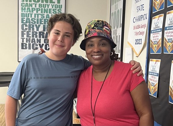 Shirley Guiteau, Graphic Design Teacher, SkillsUSA Advisor and Fashion Club Advisor along side Sophomore Parker Schmitt, a SkillsUSA member
