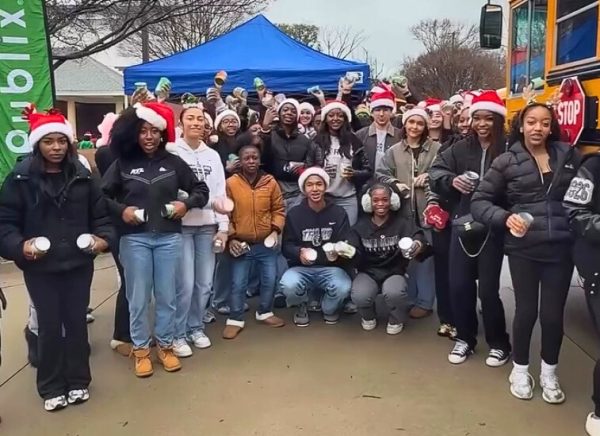 “I Can, You Can, We Can!”: The NAHS SGA proudly delivers North Atlanta’s donations with holiday cheer.