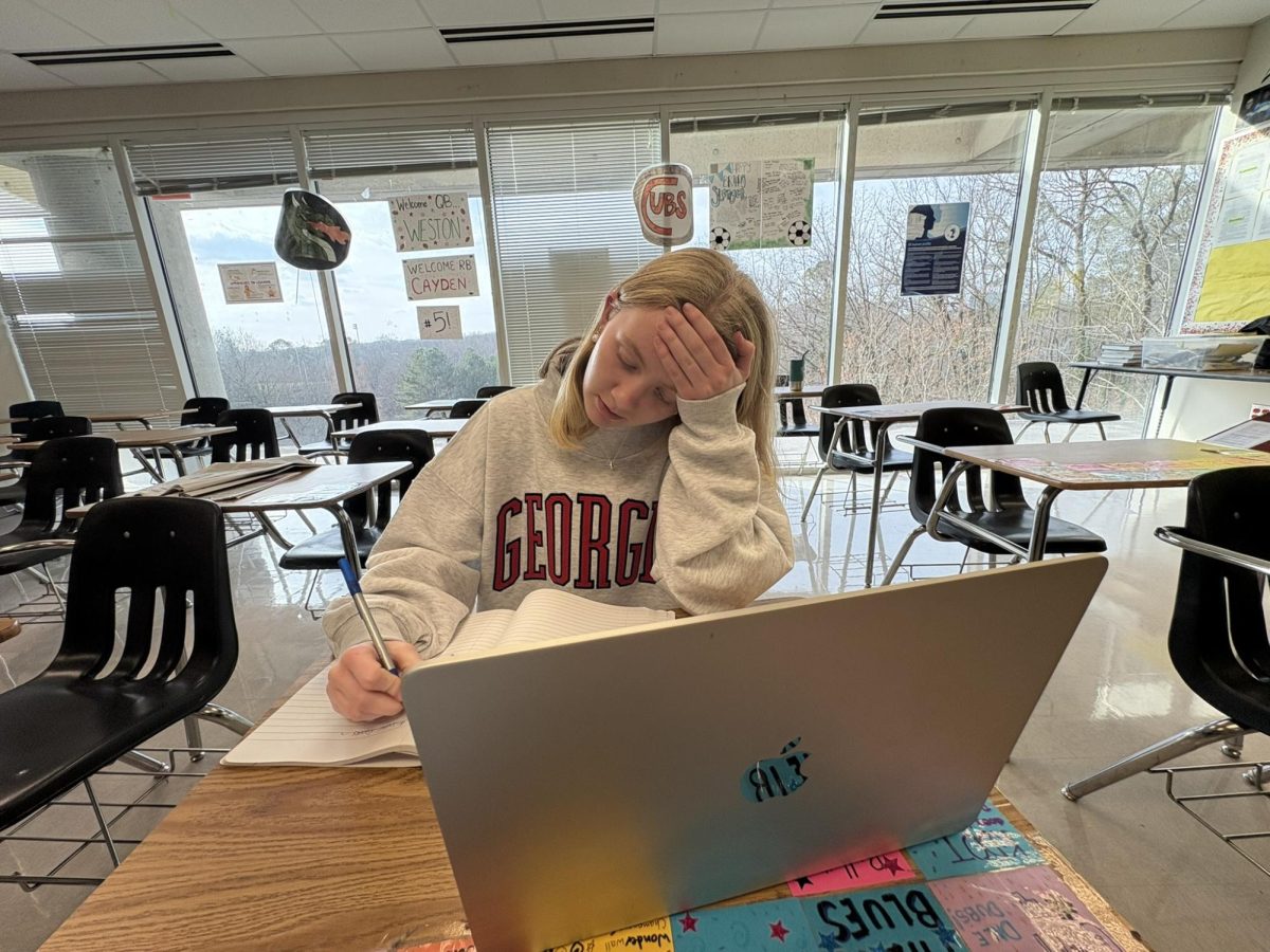 Sophomore Molly McGilvray hitting the books to prepare for upcoming finals.